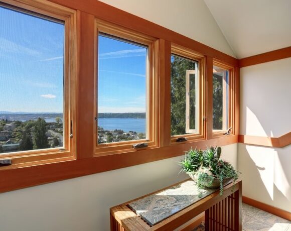 view-of-lake-through-windows-of-modern-american-home-is